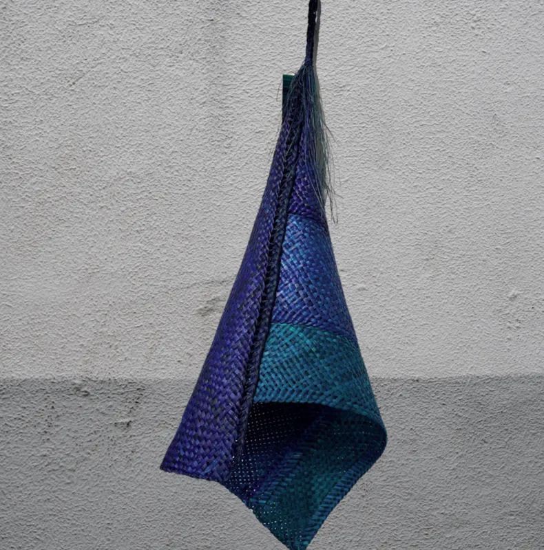 Handwoven dyed Harakeke traditional Maori Hinaki by New Zealand artist Bernie Ross, available at The Little Gallery Whangamata