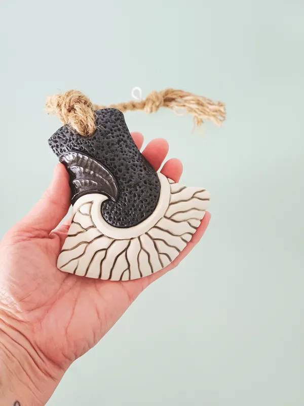 A beautifully crafted Hammerhead ceramic wall hanging by Jo Richards Hooker, available at The Little Gallery Whangamatā