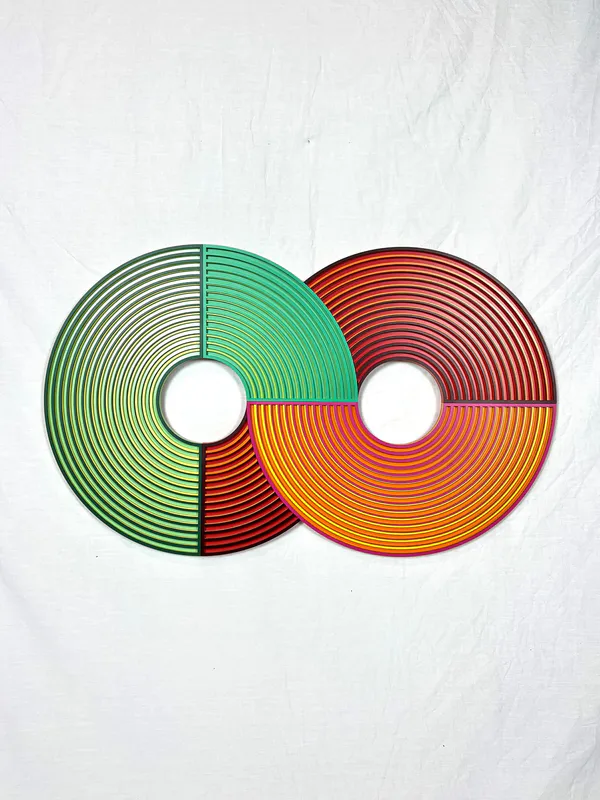 A retro-inspired wall sculpture with fluro colours by Kayla Bacon, available at The Little Gallery Whangamatā
