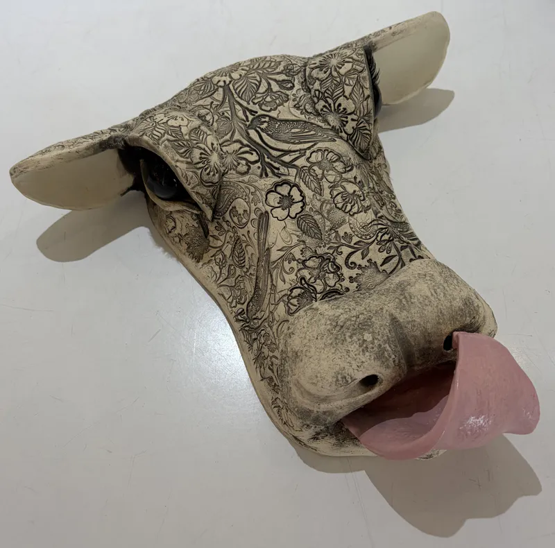 An original Ceramic Cow's Head with a tattooed design by Studio 12 Art, available at The Little Gallery Tairua