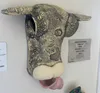 A ceramic Cow's Head licking its nose by Rachele Henderson, available at The Little Gallery Tairua