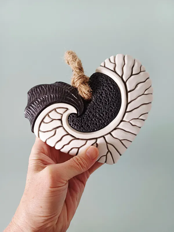 Heart shaped ceramic Heart wall hanging by Jo Richards Hooker, available at The Little Gallery Whangamatā