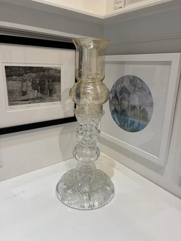 A craftfully curated recycled glass candelabra with an Orange Hurricane lamp by Sassy Maz, available at The Little Gallery Tairua