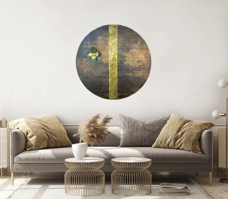 A Circular wall hanging in copper with flower by Jasmine Keir available at The Little Gallery in Tairua