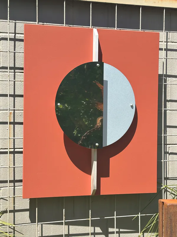 A 3D wall sculpture with a moon shape by Ashley Crabb available at The Little Gallery in Tairua