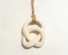 'Eternity Kumara Whalebone Pendant' by Ian Thorne, $260