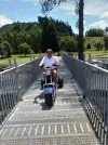Golden Oldies convenor Noel Shaw christens our new bridge at Waahi Taakaro Golf Course